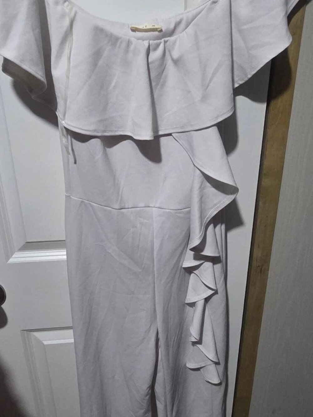 White jumpsuit with wide leg and off the shoulder neckline. Size: M #jumpsuit